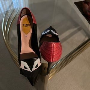Fendi “Monster Eyes” pointy toe heels